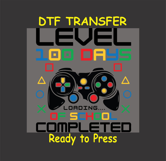 "Gamer-themed Level 100 Days Completed DTF Transfer with colorful controller design and gaming symbols."