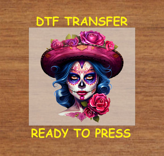 "Pink Hat La Catrina DTF Transfer featuring a sugar skull with blue hair, pink hat, and roses for Día de los Muertos."