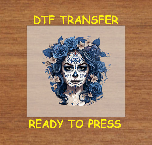 "Blue La Catrina DTF Transfer with sugar skull design and delicate blue roses for Día de los Muertos clothing."