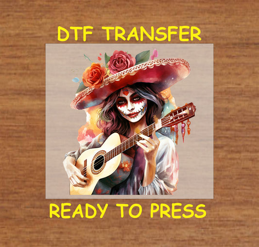 Day of the Dead DTF transfer with a colorful Catrina playing a guitar, surrounded by roses.
