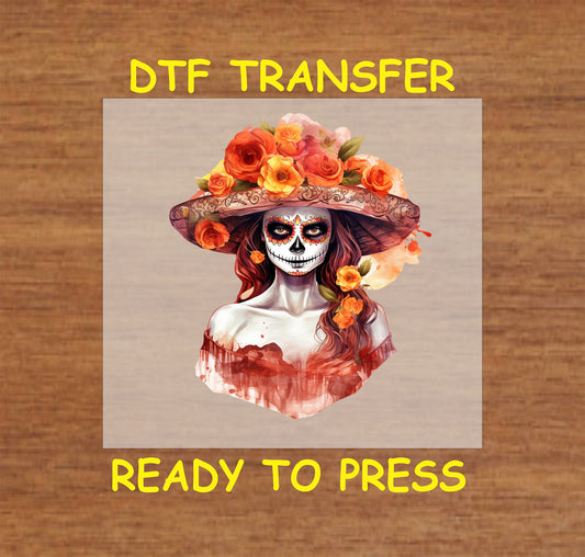Fiery Elegance Catrina DTF transfer featuring a floral orange-yellow hat, intricate details, and Día de los Muertos-inspired design.