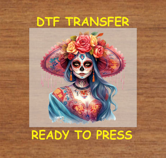 Radiant Catrina DTF transfer featuring a floral headpiece, vibrant red and blue patterns, and Día de los Muertos-inspired details.