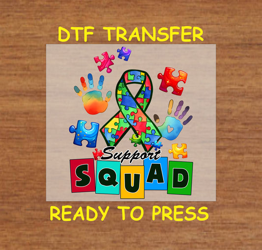 "Support Squad" Autism Awareness DTF transfer featuring a colorful puzzle piece ribbon, handprints, and bold text design.