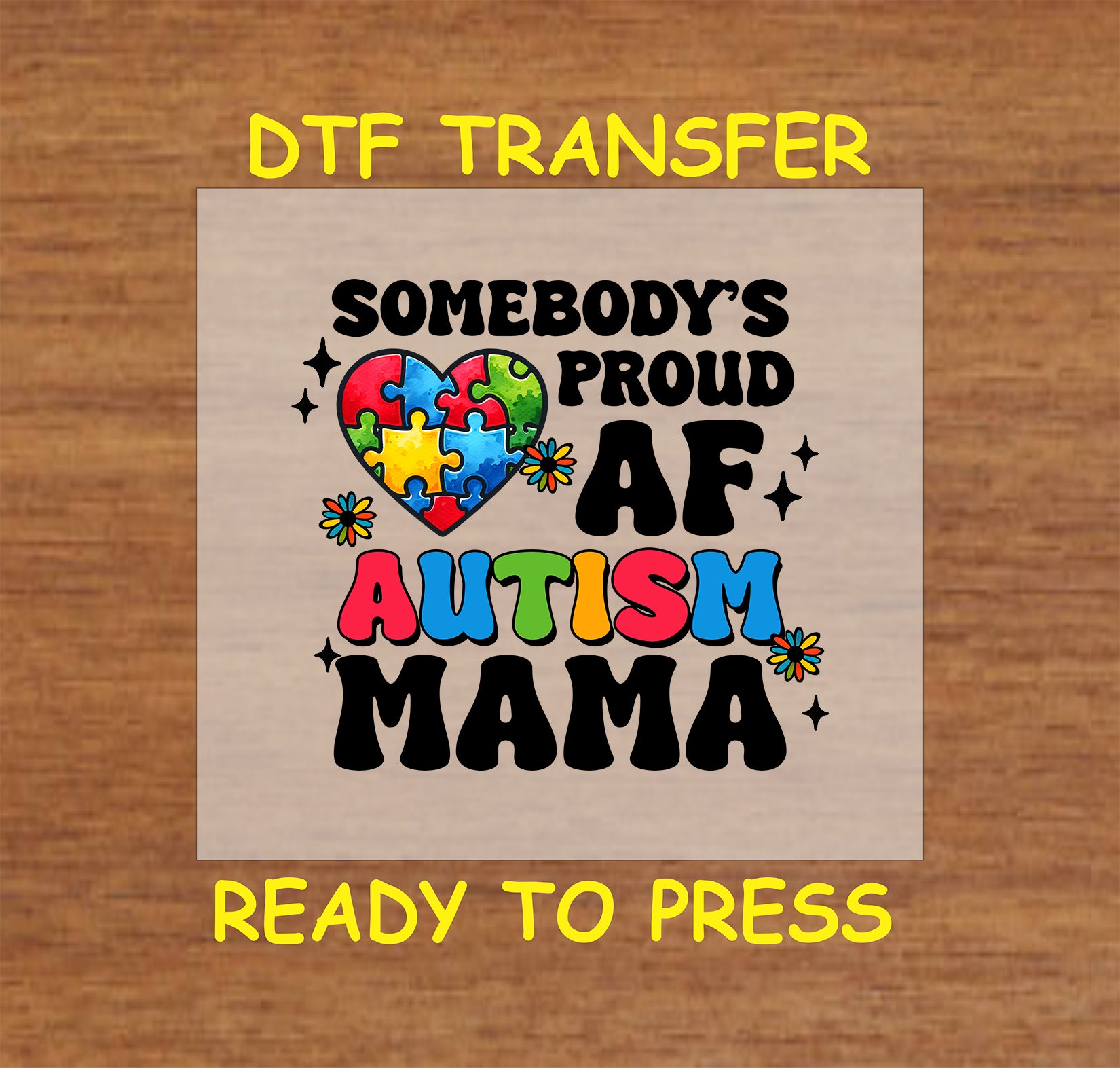 "Somebody's Proud AF Autism Mama" DTF transfer with heart-shaped puzzle pieces, colorful accents, and bold text.