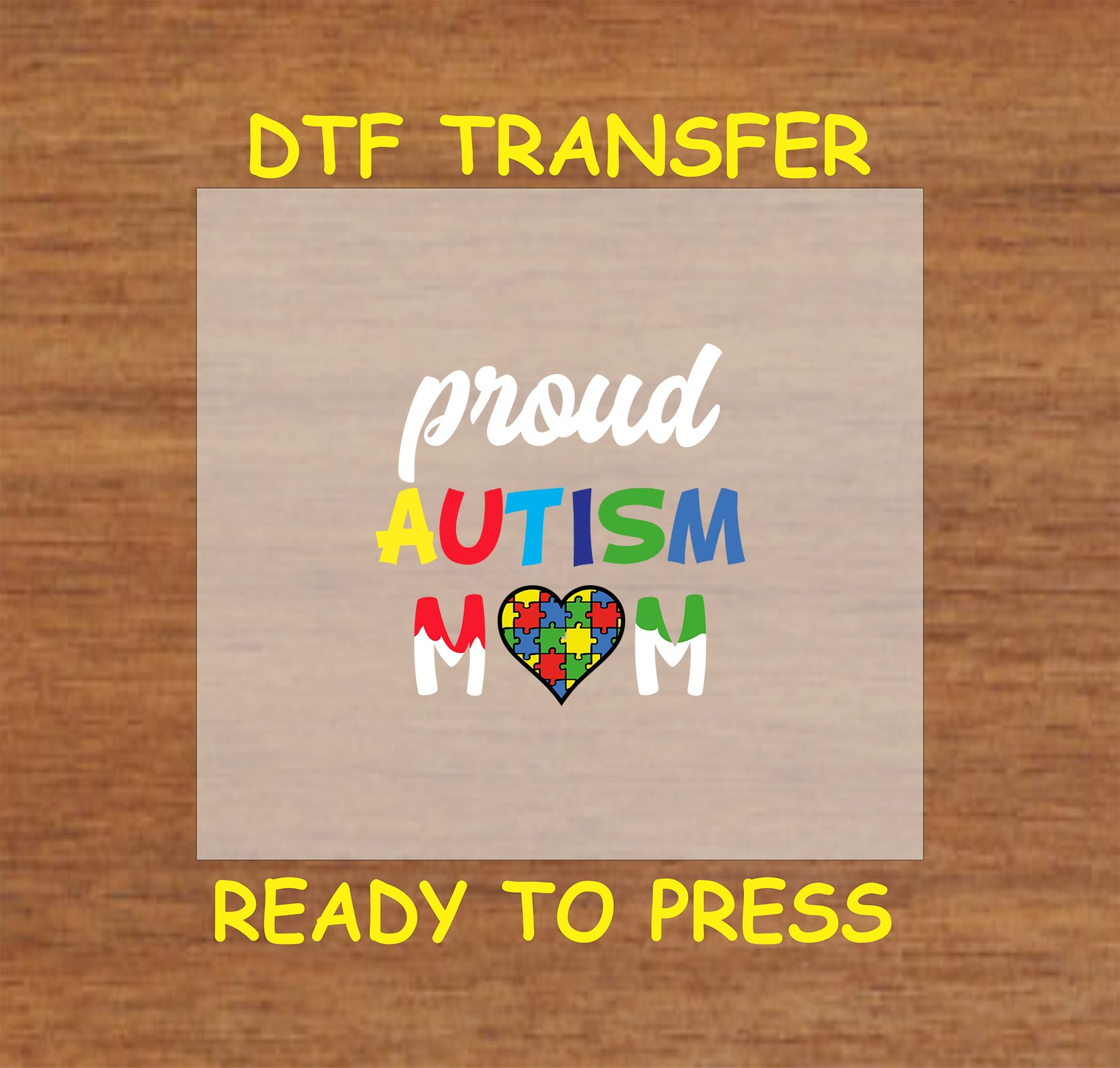 "DTF transfer featuring the phrase 'Proud Autism Mom' with colorful letters and a heart-shaped puzzle piece design."