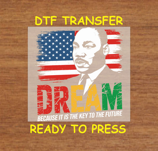 "Dream" DTF transfer featuring Martin Luther King Jr., distressed American flag, and Afrocentric colors, ready to press for custom apparel.