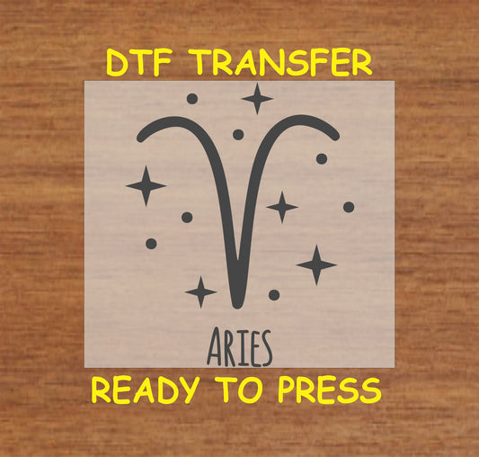 DTF transfer featuring the Aries zodiac symbol surrounded by stars in a minimalist black design.