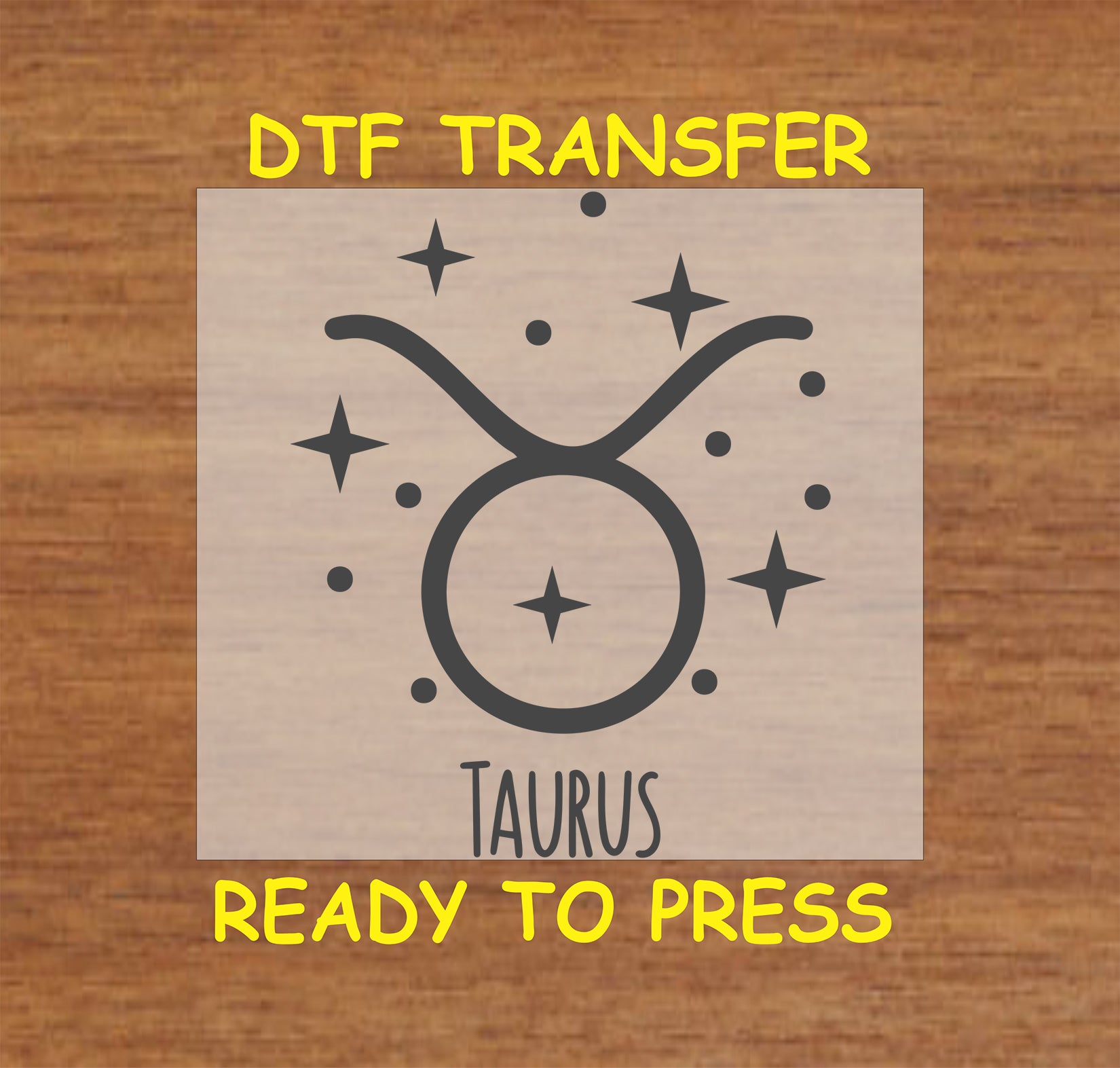 DTF transfer featuring the Taurus zodiac symbol surrounded by stars in a minimalist black design.