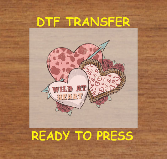 Western-style hearts with cow print, rope, roses, and "Wild at Heart" text.