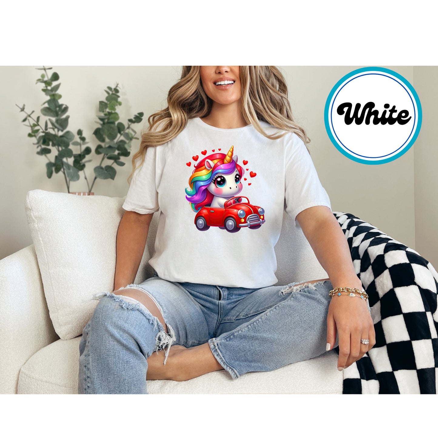 Cute unicorn with rainbow hair sitting in a red car with hearts DTF transfer.