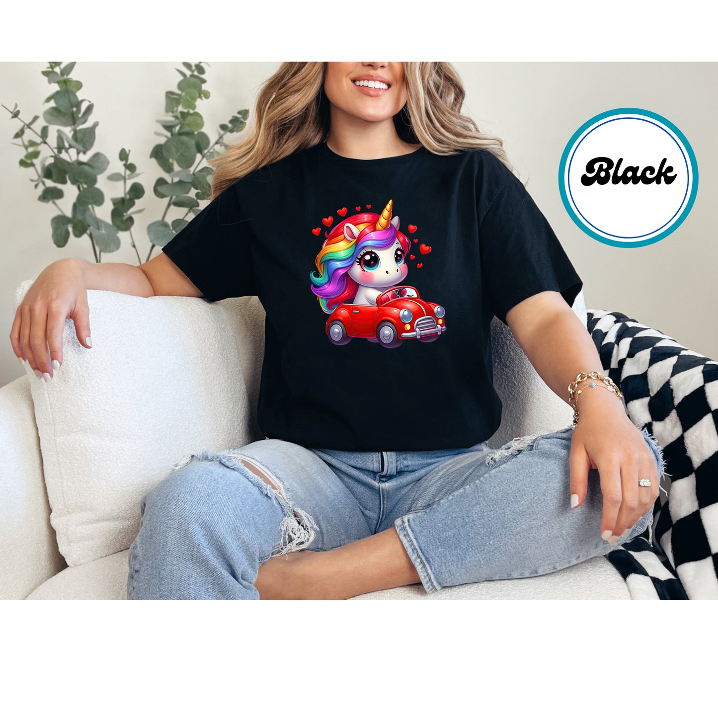 Cute unicorn with rainbow hair sitting in a red car with hearts DTF transfer.