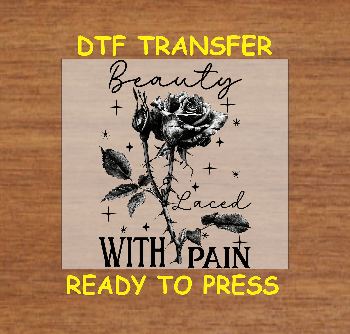Black and white thorned rose with "Beauty Laced with Pain" gothic text, DTF transfer.