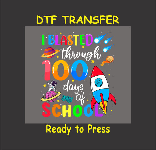 "I Blasted Through 100 Days of School" DTF transfer with a rocket, astronaut, planets, and shooting stars.