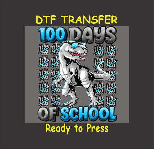 "100 Days of School" DTF transfer featuring a cool T-Rex with sunglasses and colorful school-themed elements.