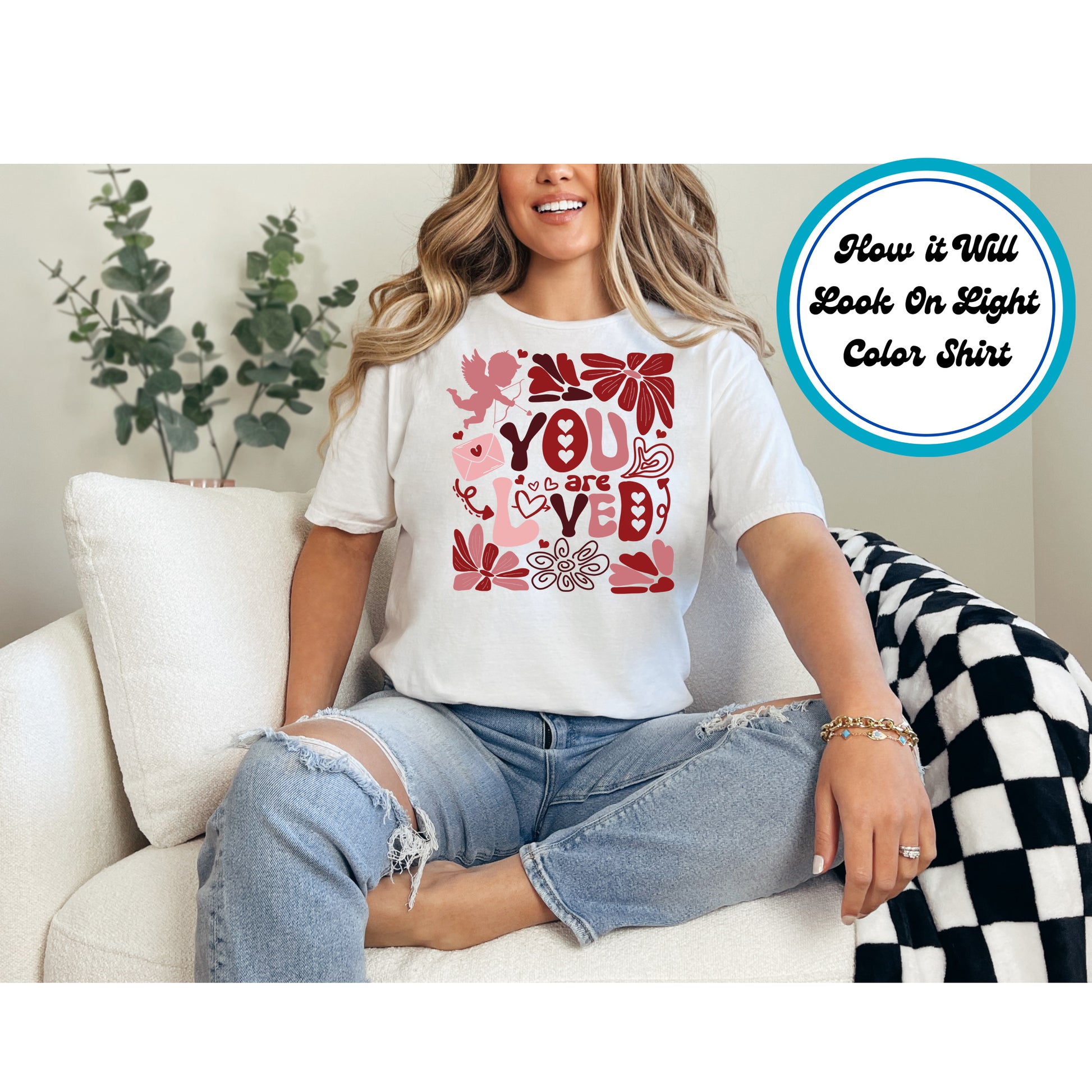 "You Are Loved" design with hearts, flowers, and cupid, perfect for Valentine's Day.