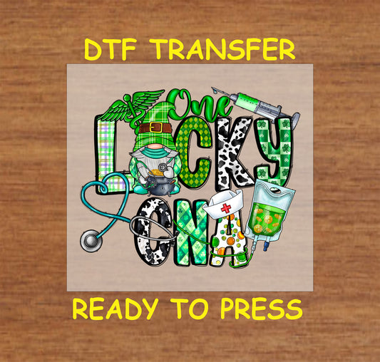 St. Patrick’s Day One Lucky CNA DTF transfer with a leprechaun, shamrocks, and medical symbols.