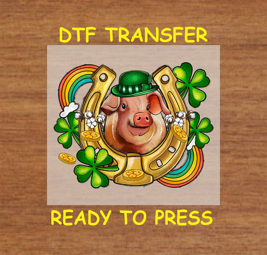 St. Patrick’s Day Lucky Pig DTF transfer with a pig, horseshoe, shamrocks, and rainbow.