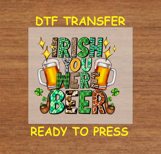 Two beer mugs with shamrocks and "Irish You Were Beer" text.