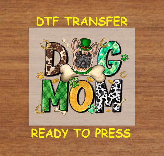St. Patrick’s Day DTF transfer with "Dog Mom" text, French Bulldog, paw prints, shamrocks, and gold coins.