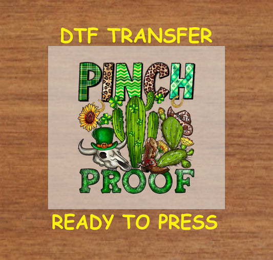 St. Patrick’s Day DTF transfer with "Pinch Proof" text, cactus, steer skull, cowboy boot, and shamrocks.