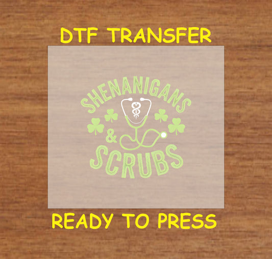 St. Patrick’s Day DTF transfer with "Shenanigans & Scrubs" text, shamrocks, stethoscope, and medical emblem.