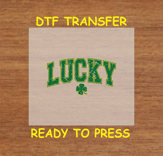 St. Patrick’s Day DTF transfer with "LUCKY" in bold collegiate text and a shamrock.