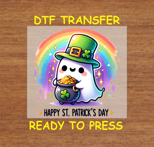 Cute ghost in a leprechaun hat holding a pot of gold under a rainbow.