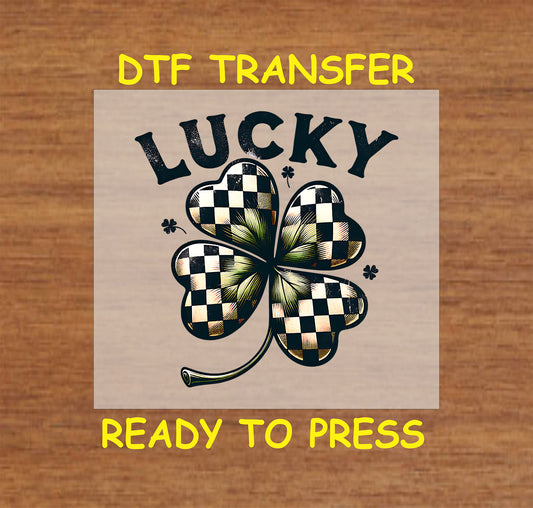 Checkered shamrock with "Lucky" text in bold black font.