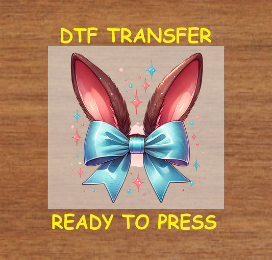 Bunny ears with a large blue bow and sparkling accents.