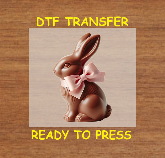 Chocolate bunny with a pastel pink bow, ideal for Easter apparel.