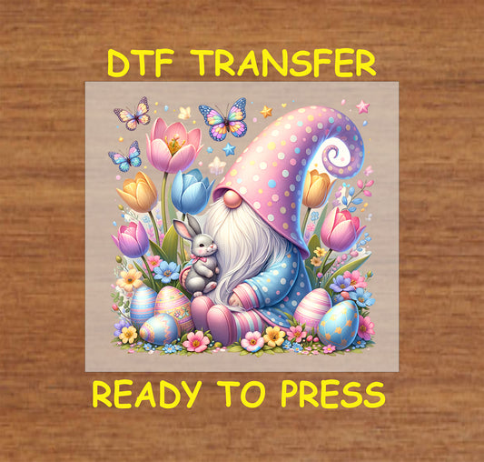 Easter gnome holding a bunny with spring flowers, butterflies, and Easter eggs.