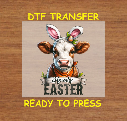 Cow wearing bunny ears and a bandana with "Howdy Easter" text.