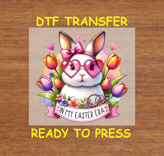 Bunny with heart sunglasses, a bow, and tulips, with "In My Easter Era" text.