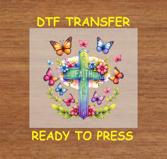 Faith cross DTF transfer with colorful butterflies, flowers, and intricate details.