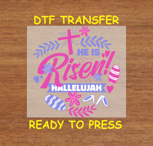 Christian Easter DTF transfer with "He Is Risen" text, cross, floral elements, and Easter eggs.