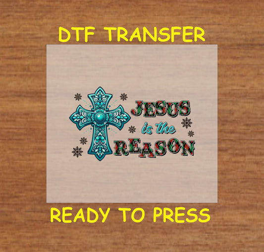 Ornate turquoise cross with "Jesus Is the Reason" text and decorative snowflakes.