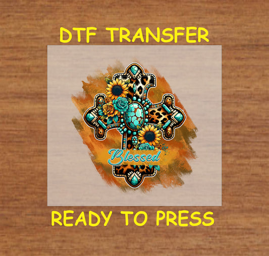 Leopard print cross with turquoise stones, sunflowers, and "Blessed" text on a rustic background.