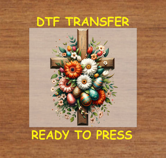 Rustic wooden cross with colorful flowers and decorative Easter eggs in a Christian DTF transfer.