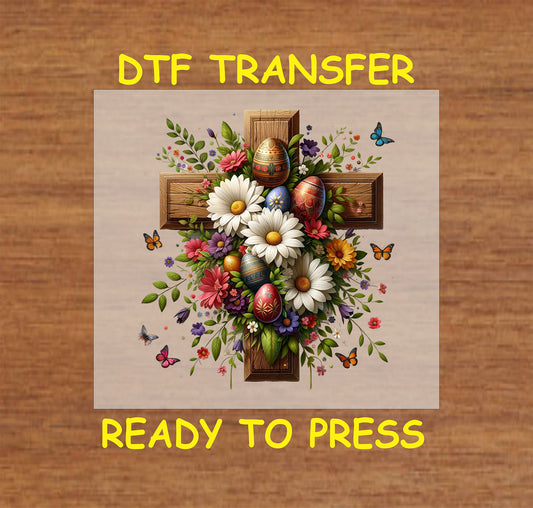 Wooden cross with daisies, colorful flowers, and decorative Easter eggs in a Christian DTF transfer.