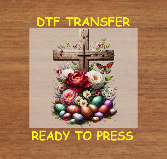 Rustic wooden cross with colorful Easter eggs, flowers, and butterflies.