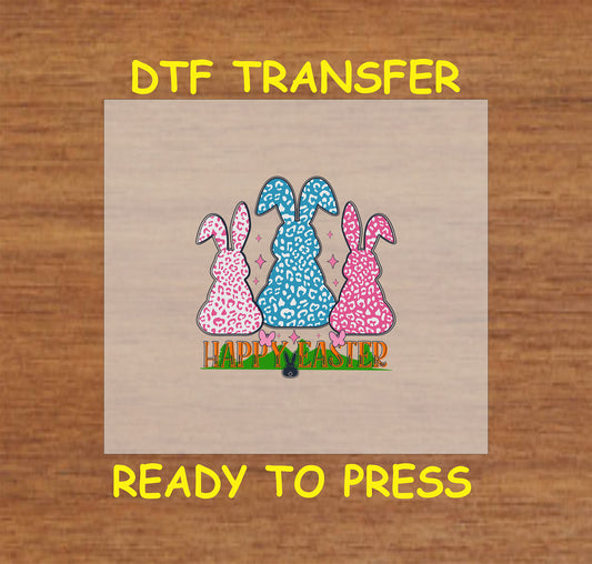 Happy Easter DTF transfer with three leopard-print bunnies in pink and blue.