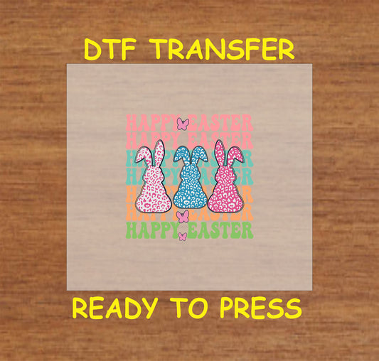 Happy Easter DTF transfer with three leopard-print bunnies and colorful text.