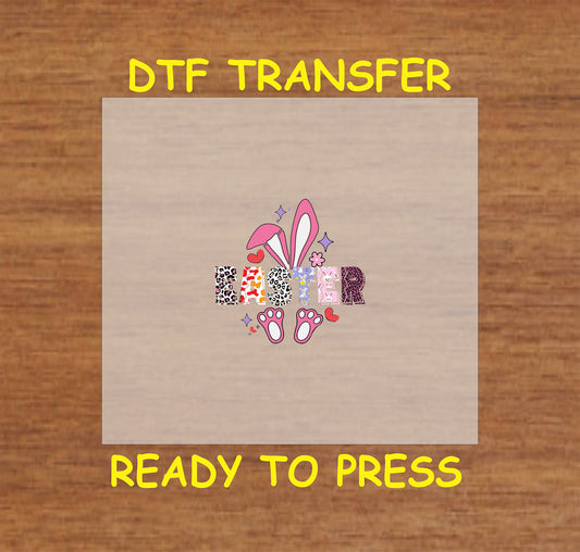 Easter DTF transfer with bunny ears, paws, and leopard print lettering.