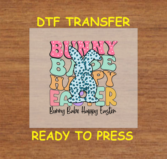 Easter DTF transfer with blue leopard print bunny and colorful text.