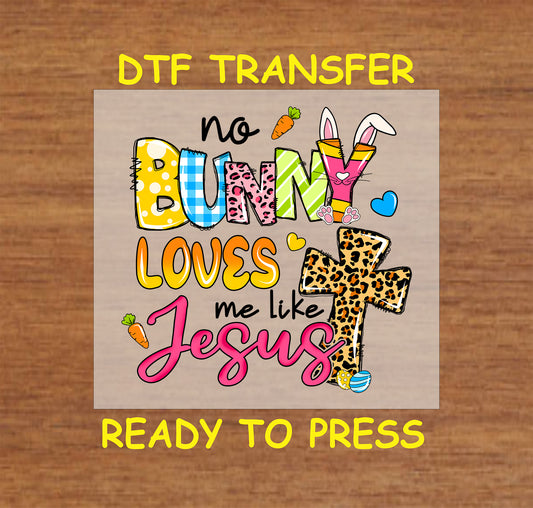 No Bunny Loves Me Like Jesus DTF transfer with colorful patterns, bunny ears, and a leopard print cross.