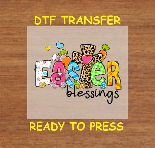 DTF transfer with "Easter Blessings" text, a leopard print cross, bunny ears, colorful eggs, and decorative patterns.