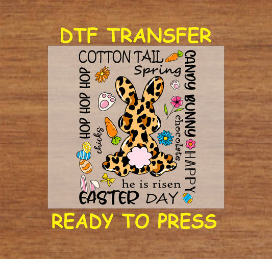 DTF transfer with a leopard bunny, Easter words, and festive illustrations.