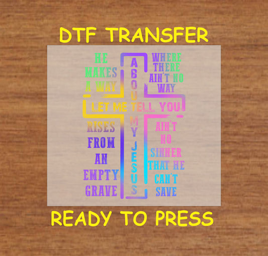 Multicolor text forming a cross with the phrase "Let Me Tell You About My Jesus" and scripture-inspired words.