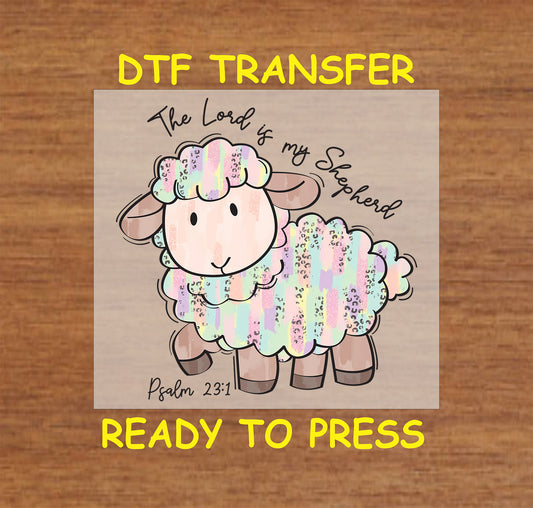 Pastel watercolor lamb with "The Lord Is My Shepherd" text and Psalm 23:1 scripture.