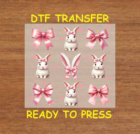 Easter DTF transfer featuring white bunnies with pink bows, bunny ears, and satin ribbon bows in a patch-style layout.